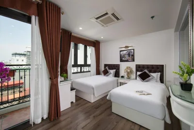 Junior Suite met Balkon — Hanoi TrangTrang Hotel