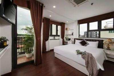 Junior Suite met Terras — Hanoi TrangTrang Hotel